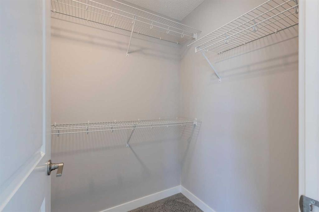 306 Haskayne Drive Nw, Calgary, AB - Indoor With Storage