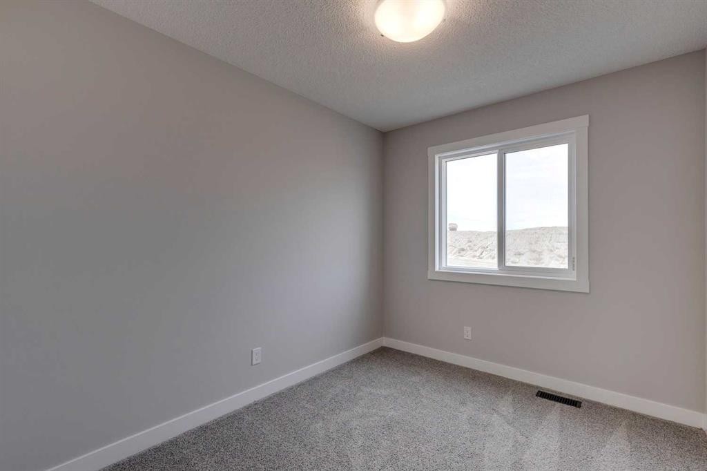 306 Haskayne Drive Nw, Calgary, AB - Indoor Photo Showing Other Room