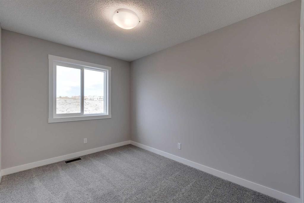 306 Haskayne Drive Nw, Calgary, AB - Indoor Photo Showing Other Room
