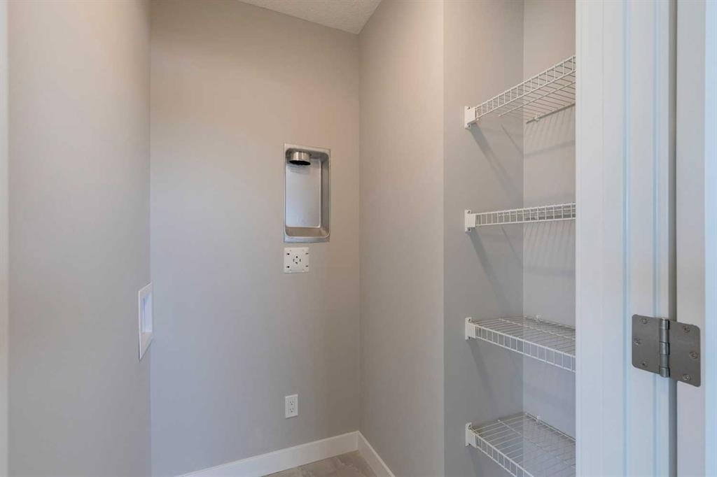 306 Haskayne Drive Nw, Calgary, AB - Indoor With Storage