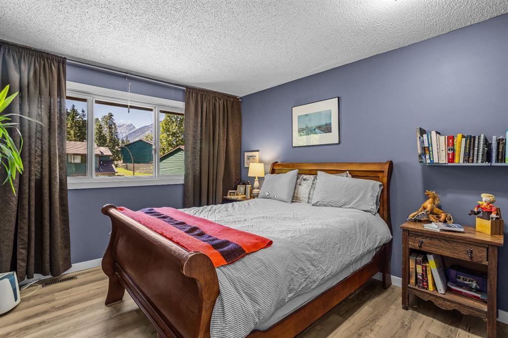 246 Kluane Drive, Banff, AB - Indoor Photo Showing Bedroom