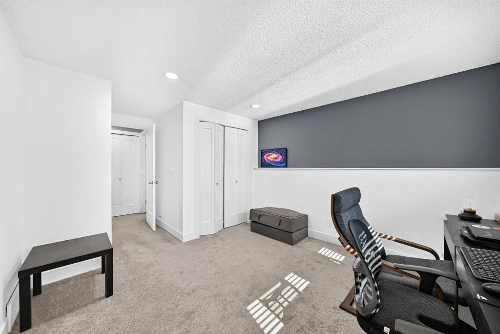 12 Sunvale Mews Se, Calgary, AB - Indoor Photo Showing Other Room