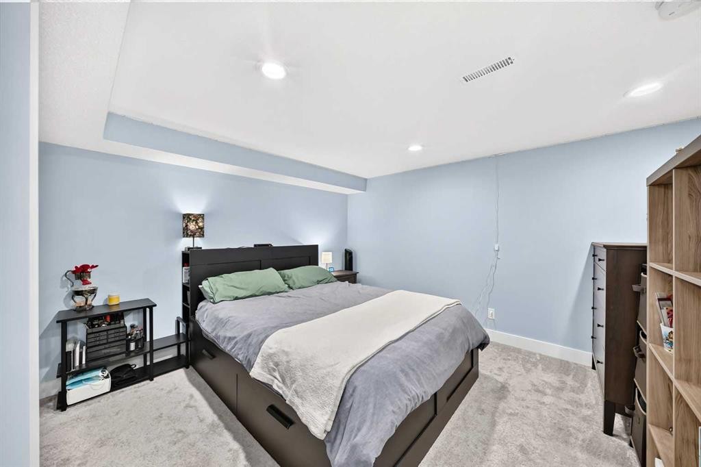 12 Sunvale Mews Se, Calgary, AB - Indoor Photo Showing Bedroom