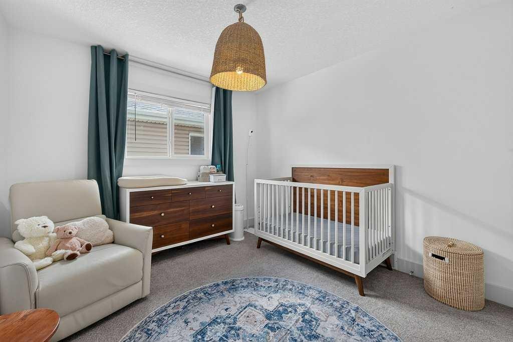 232 Copperpond Circle Se, Calgary, AB - Indoor Photo Showing Bedroom