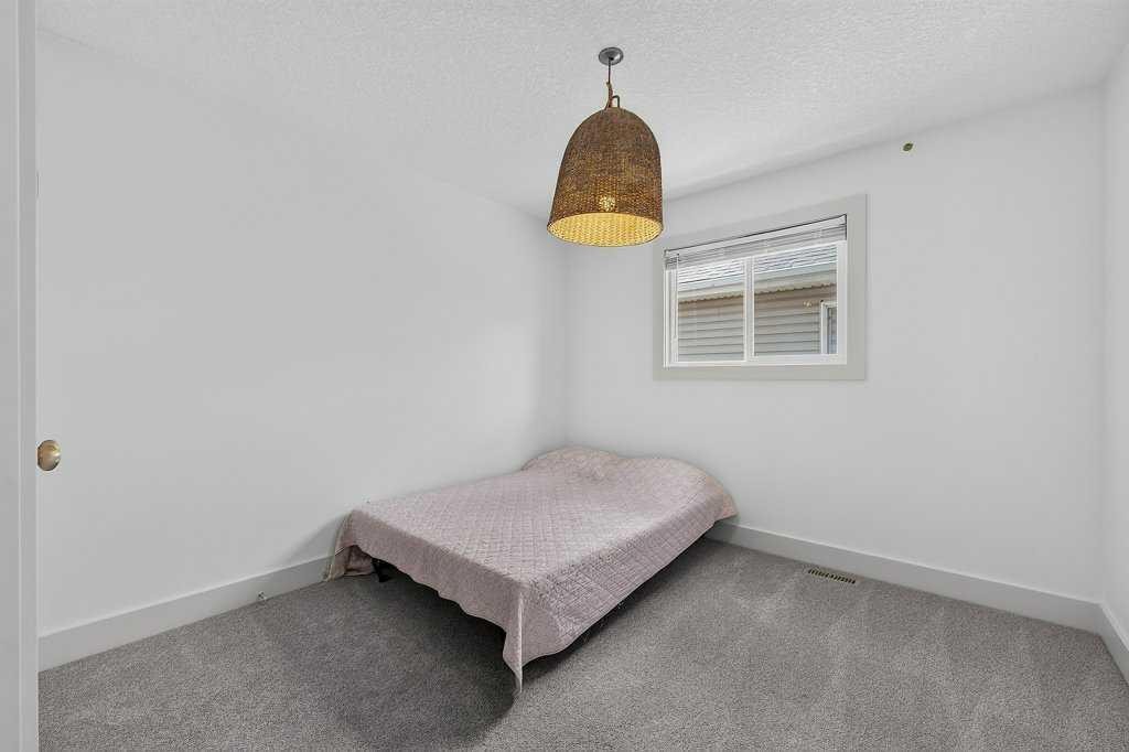 232 Copperpond Circle Se, Calgary, AB - Indoor Photo Showing Bedroom