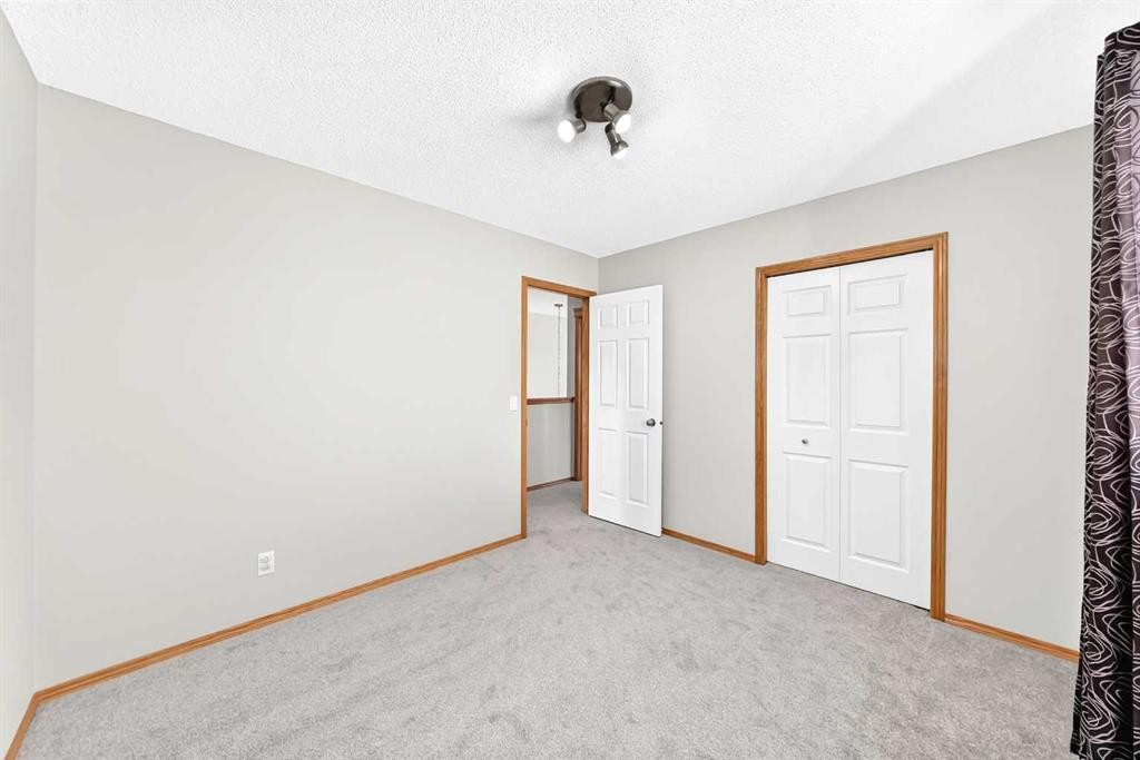 83 Edgeridge Close Nw, Calgary, AB - Indoor Photo Showing Other Room