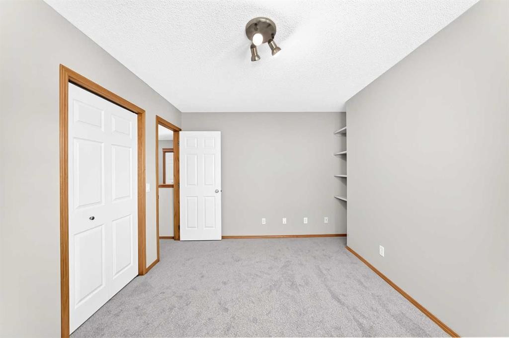 83 Edgeridge Close Nw, Calgary, AB - Indoor Photo Showing Other Room