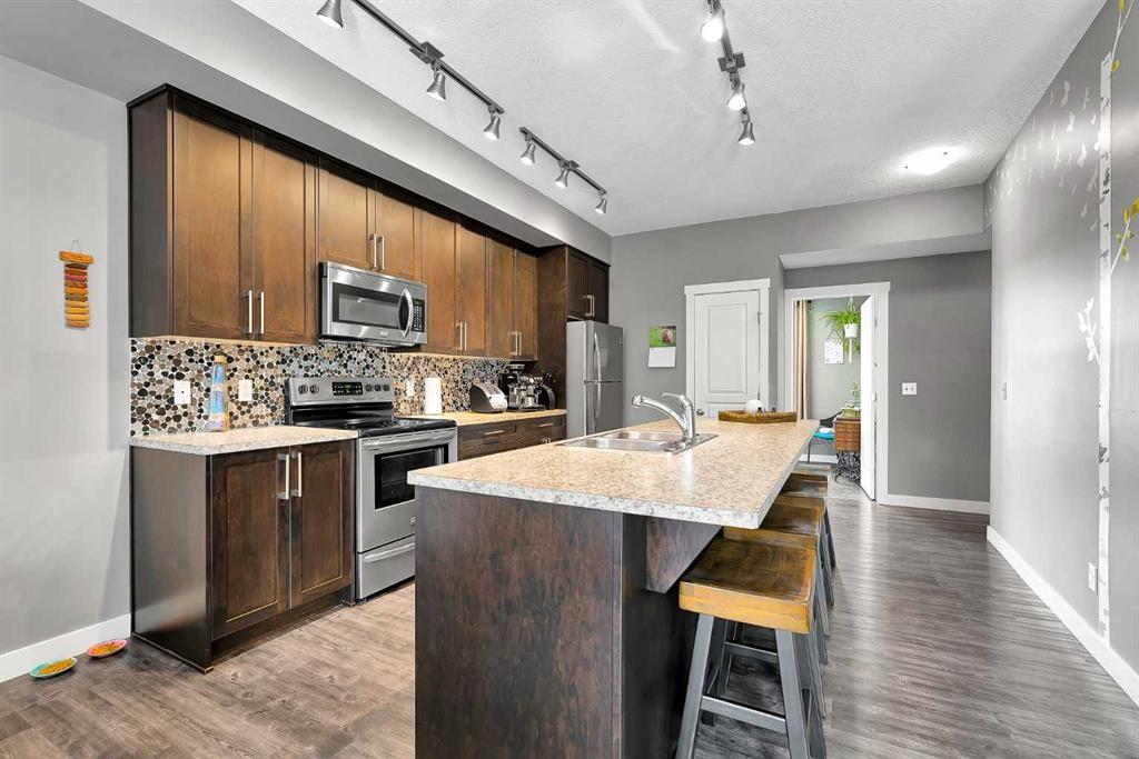 410 Cranford Walk Se, Calgary, AB - Indoor Photo Showing Kitchen With Upgraded Kitchen
