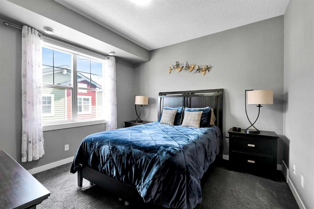 410 Cranford Walk Se, Calgary, AB - Indoor Photo Showing Bedroom