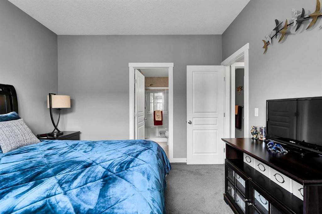 410 Cranford Walk Se, Calgary, AB - Indoor Photo Showing Bedroom