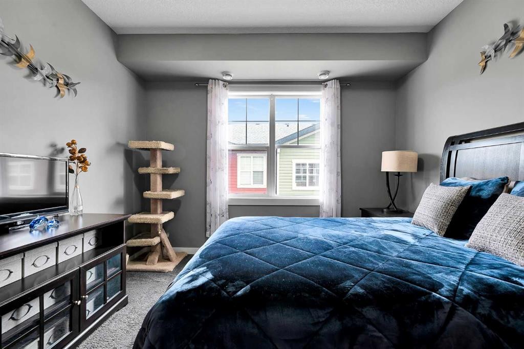 410 Cranford Walk Se, Calgary, AB - Indoor Photo Showing Bedroom