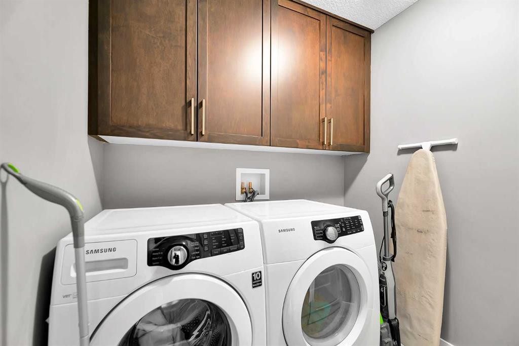 410 Cranford Walk Se, Calgary, AB - Indoor Photo Showing Laundry Room