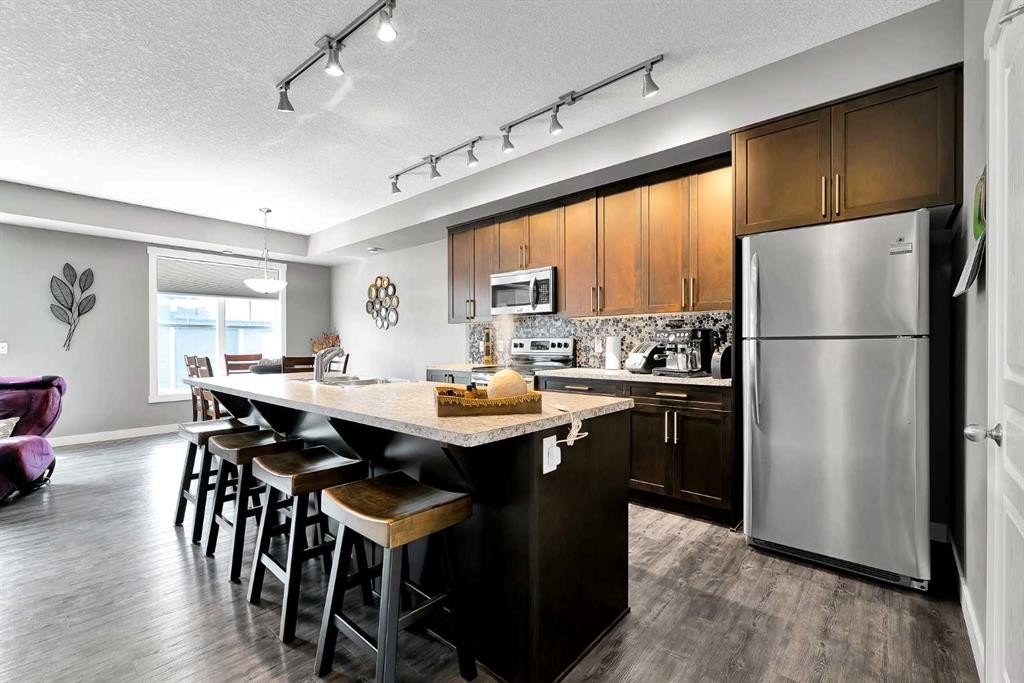 410 Cranford Walk Se, Calgary, AB - Indoor Photo Showing Kitchen With Upgraded Kitchen