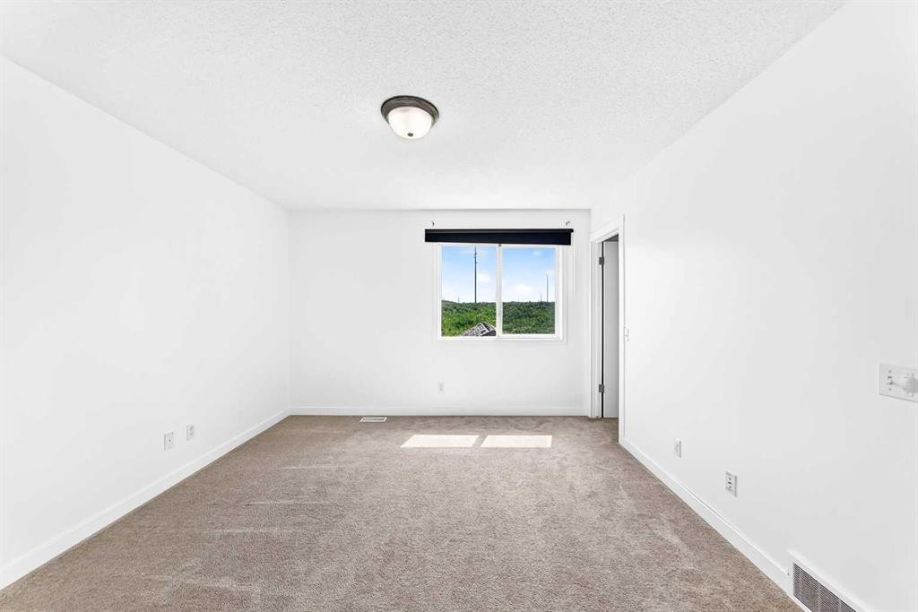 294 Elgin View Se, Calgary, AB - Indoor Photo Showing Other Room