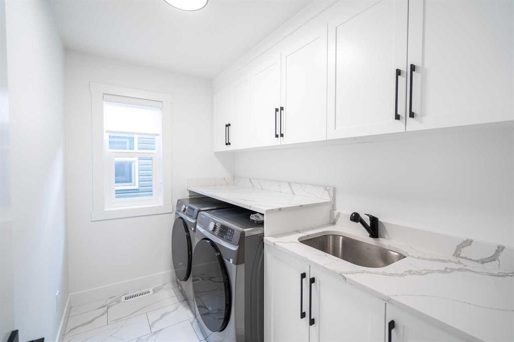 123 Saddlecrest Grove Ne, Calgary, AB - Indoor Photo Showing Laundry Room