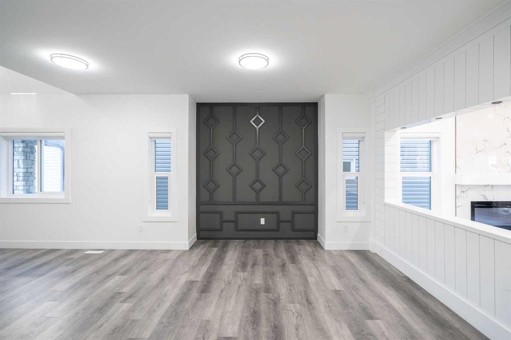 123 Saddlecrest Grove Ne, Calgary, AB - Indoor Photo Showing Other Room With Fireplace