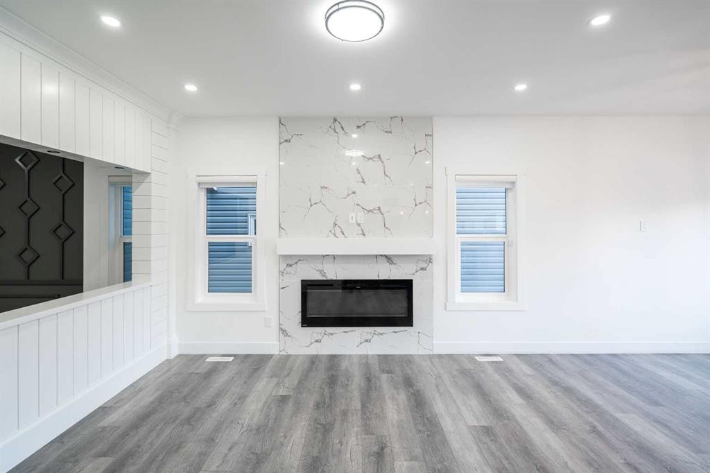 123 Saddlecrest Grove Ne, Calgary, AB - Indoor Photo Showing Living Room With Fireplace