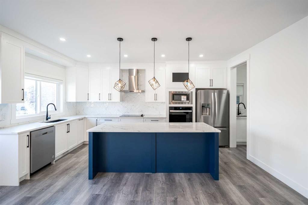 123 Saddlecrest Grove Ne, Calgary, AB - Indoor Photo Showing Kitchen With Stainless Steel Kitchen With Upgraded Kitchen
