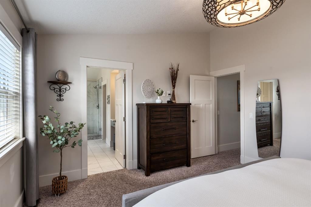 313 Centre Avenue Se, Airdrie, AB - Indoor Photo Showing Bedroom