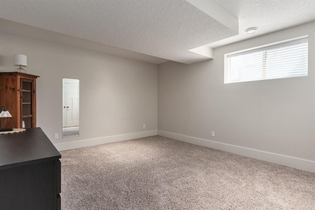 313 Centre Avenue Se, Airdrie, AB - Indoor Photo Showing Other Room