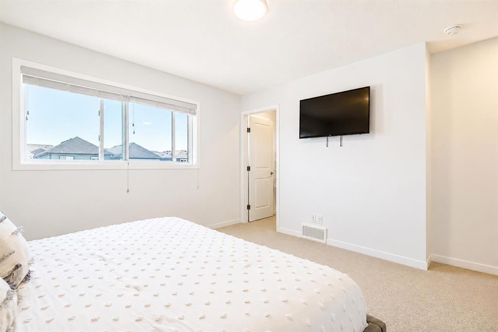 229 Masters Row Se, Calgary, AB - Indoor Photo Showing Bedroom