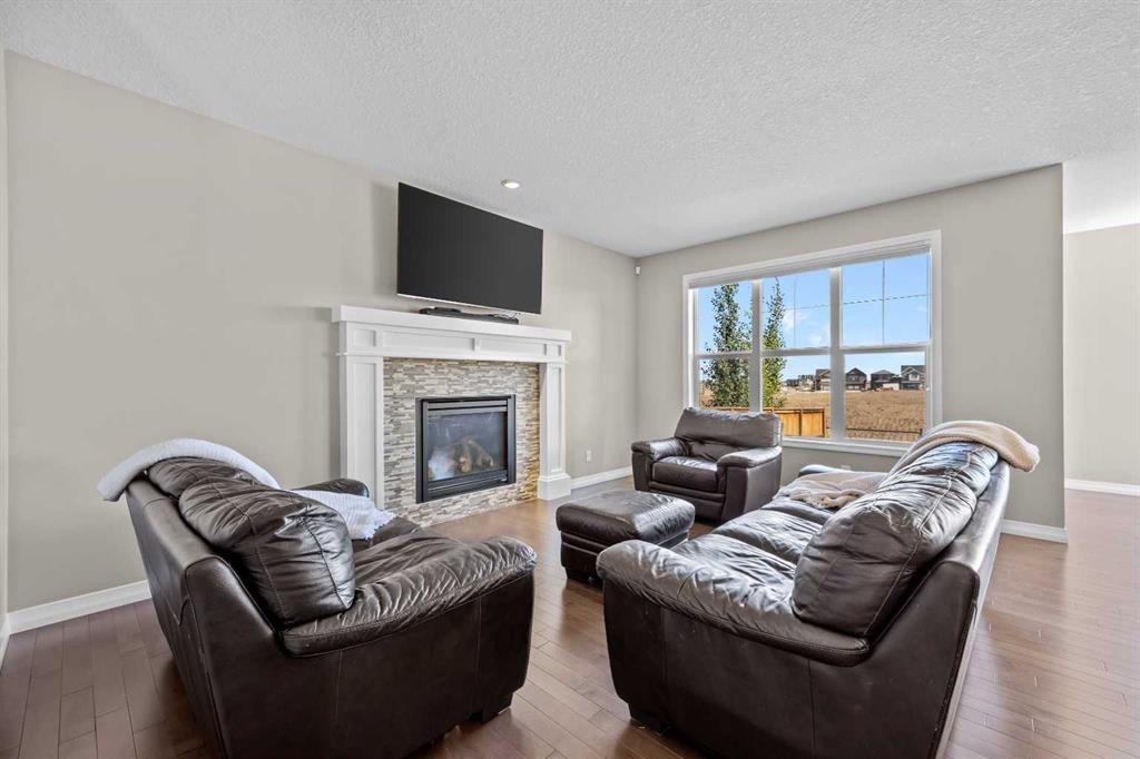 27 Mahogany Crescent Se, Calgary, AB - Indoor Photo Showing Living Room With Fireplace
