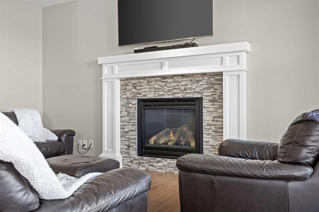 27 Mahogany Crescent Se, Calgary, AB - Indoor Photo Showing Living Room With Fireplace