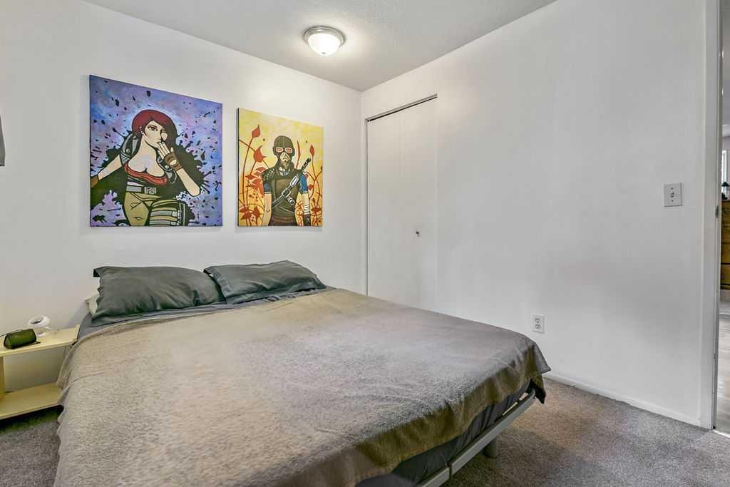 311 Penbrooke Crescent Se, Calgary, AB - Indoor Photo Showing Bedroom