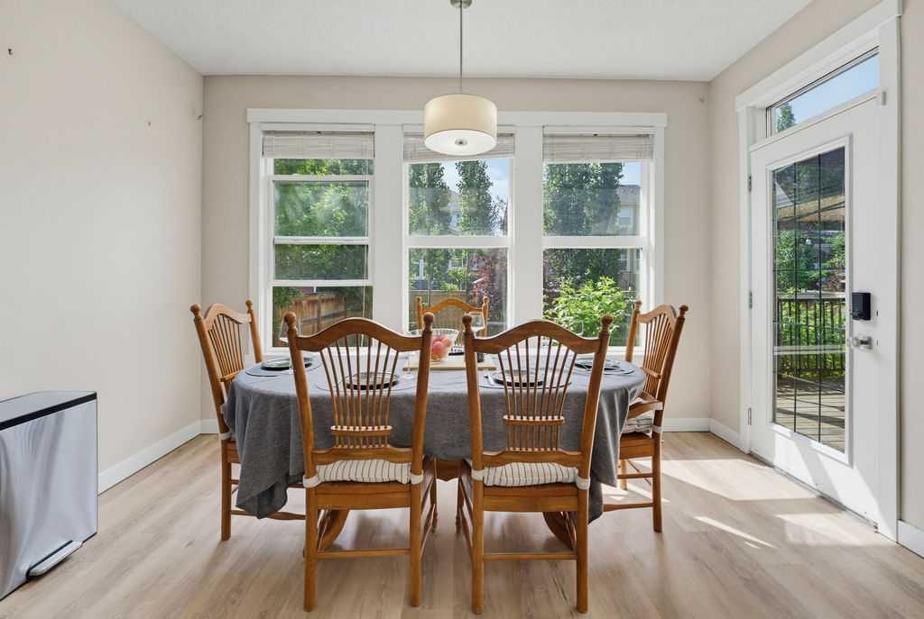 145 Sunset Manor, Cochrane, AB - Indoor Photo Showing Dining Room