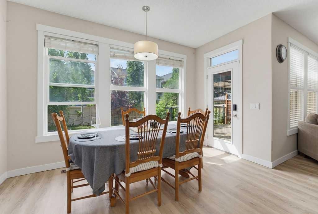 145 Sunset Manor, Cochrane, AB - Indoor Photo Showing Dining Room