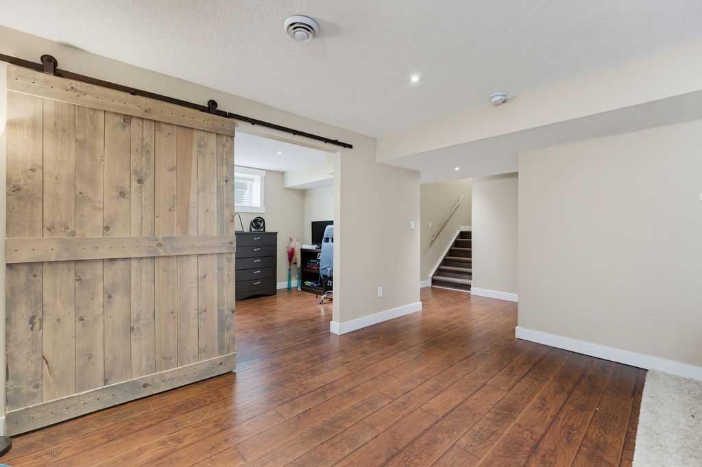 145 Sunset Manor, Cochrane, AB - Indoor Photo Showing Other Room