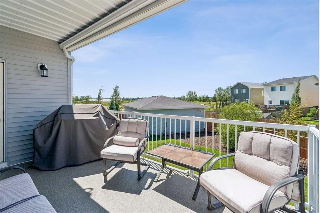 7 Bishop Circle, Carstairs, AB - Outdoor With Deck Patio Veranda With Exterior
