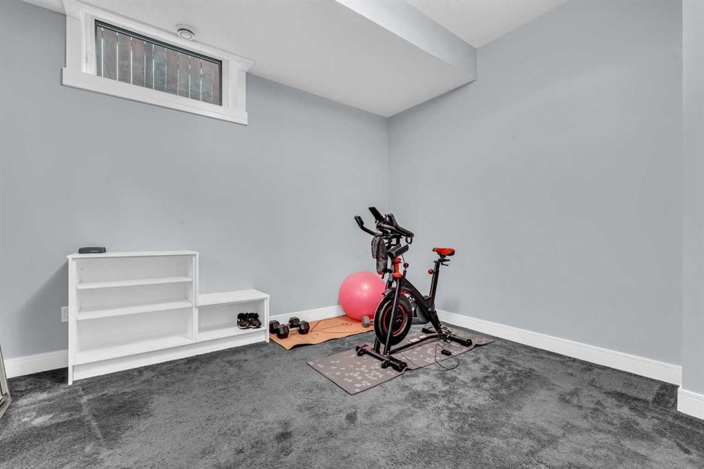 2417 25 Avenue Nw, Calgary, AB - Indoor Photo Showing Gym Room