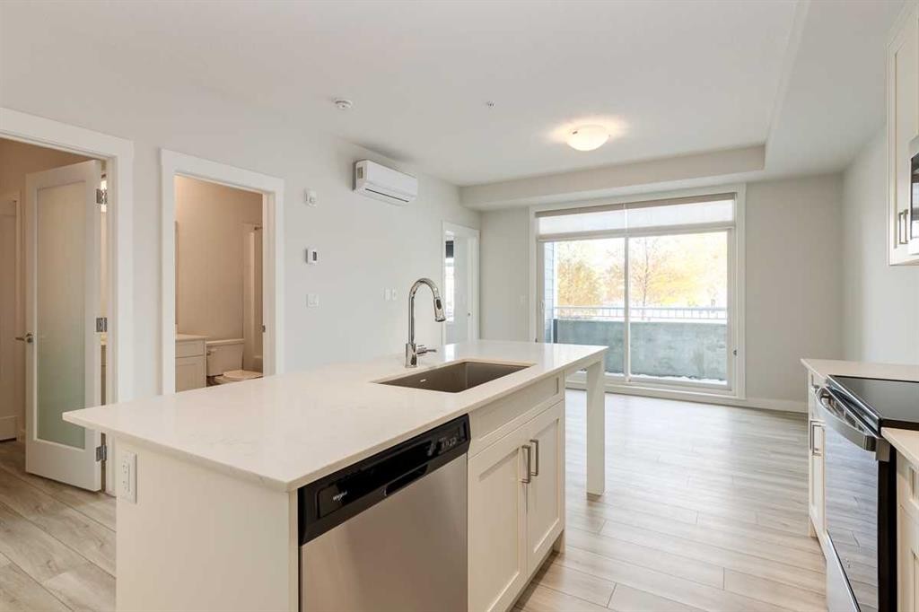 107-500 Auburn Meadows Common Se, Calgary, AB - Indoor Photo Showing Kitchen With Upgraded Kitchen