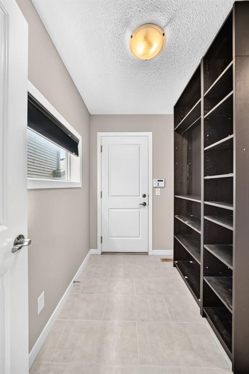 135 Evansridge Crescent Nw, Calgary, AB - Indoor Photo Showing Other Room
