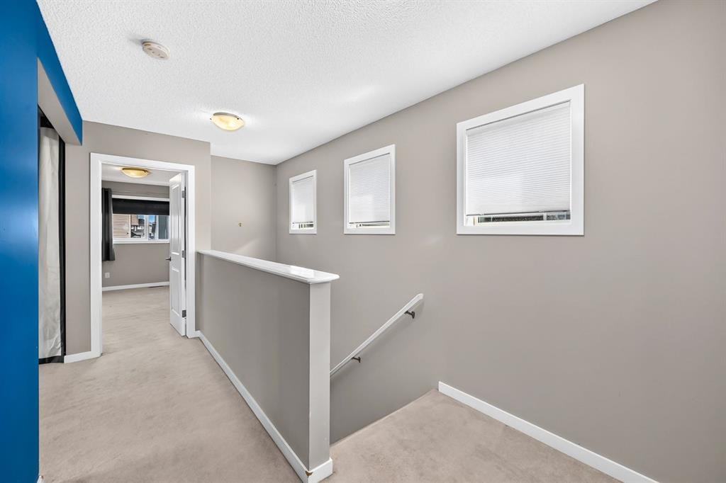 135 Evansridge Crescent Nw, Calgary, AB - Indoor Photo Showing Other Room