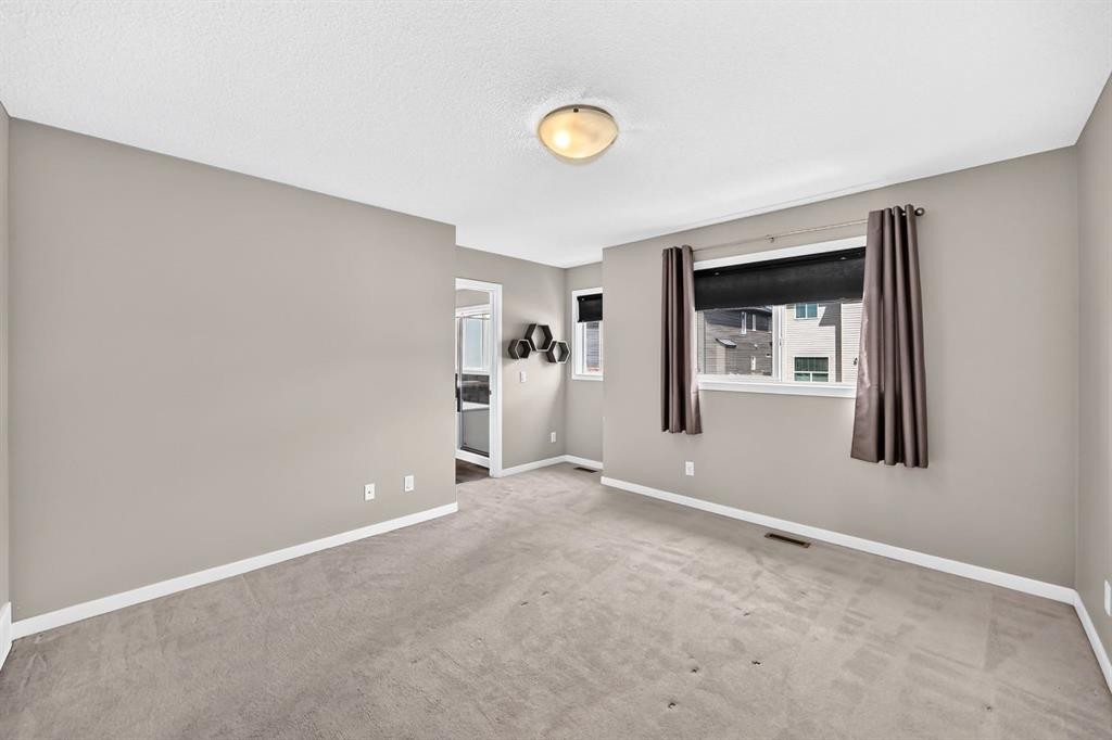 135 Evansridge Crescent Nw, Calgary, AB - Indoor Photo Showing Other Room