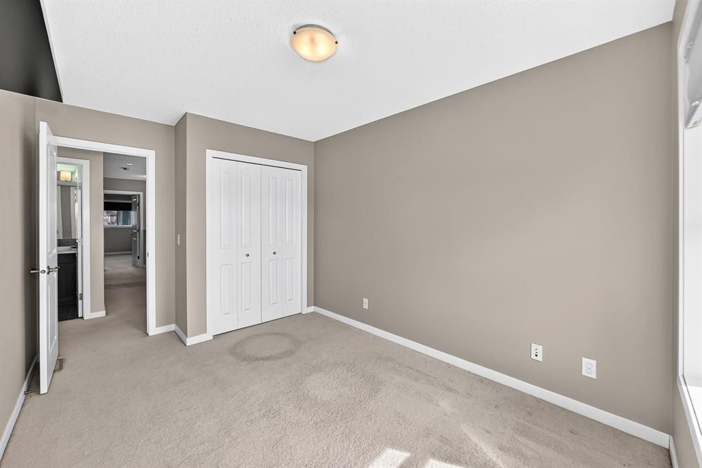 135 Evansridge Crescent Nw, Calgary, AB - Indoor Photo Showing Other Room