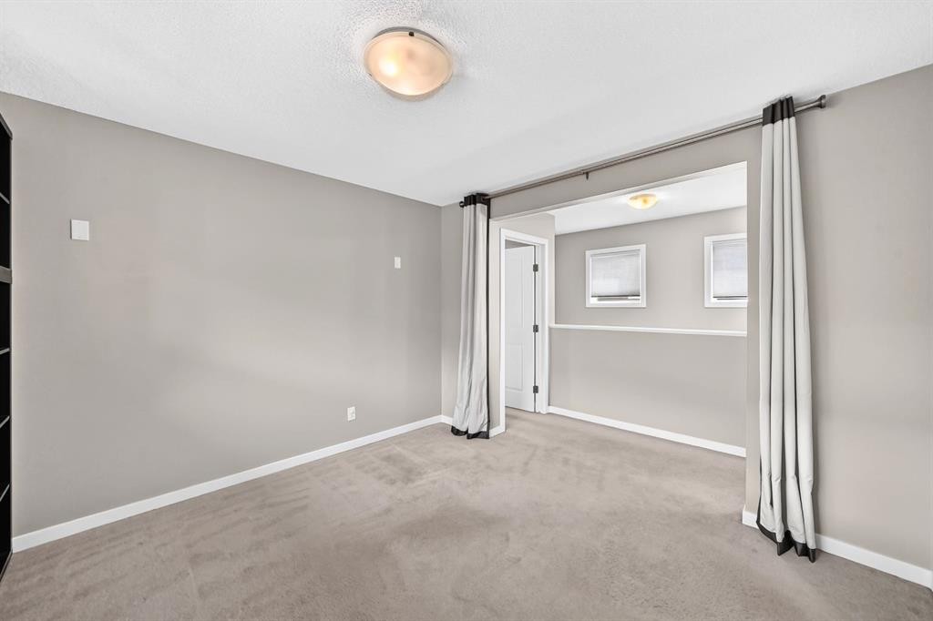 135 Evansridge Crescent Nw, Calgary, AB - Indoor Photo Showing Other Room
