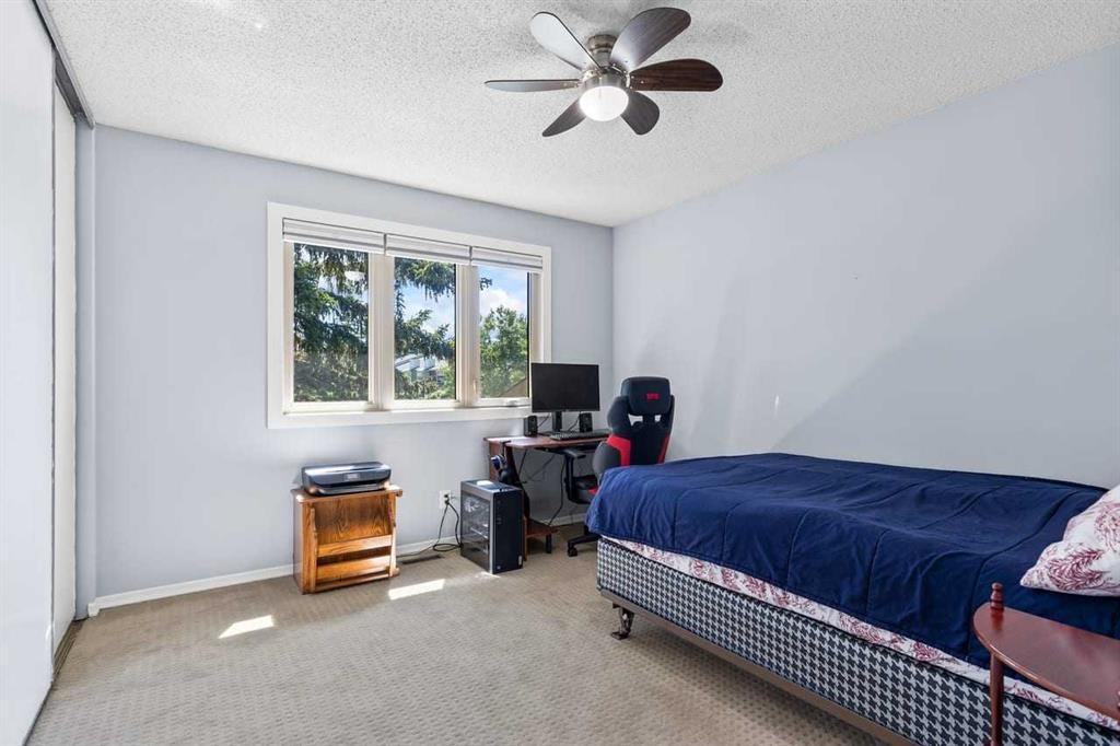 12-10001 Brookpark Boulevard Sw, Calgary, AB - Indoor Photo Showing Bedroom