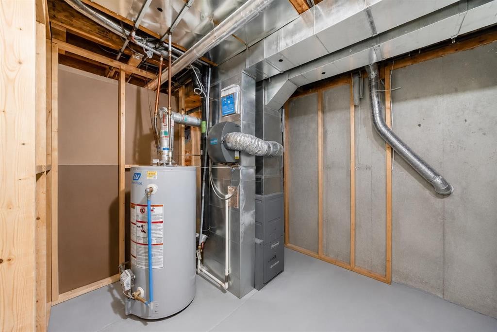 101 Hidden Valley Villas Nw, Calgary, AB - Indoor Photo Showing Basement