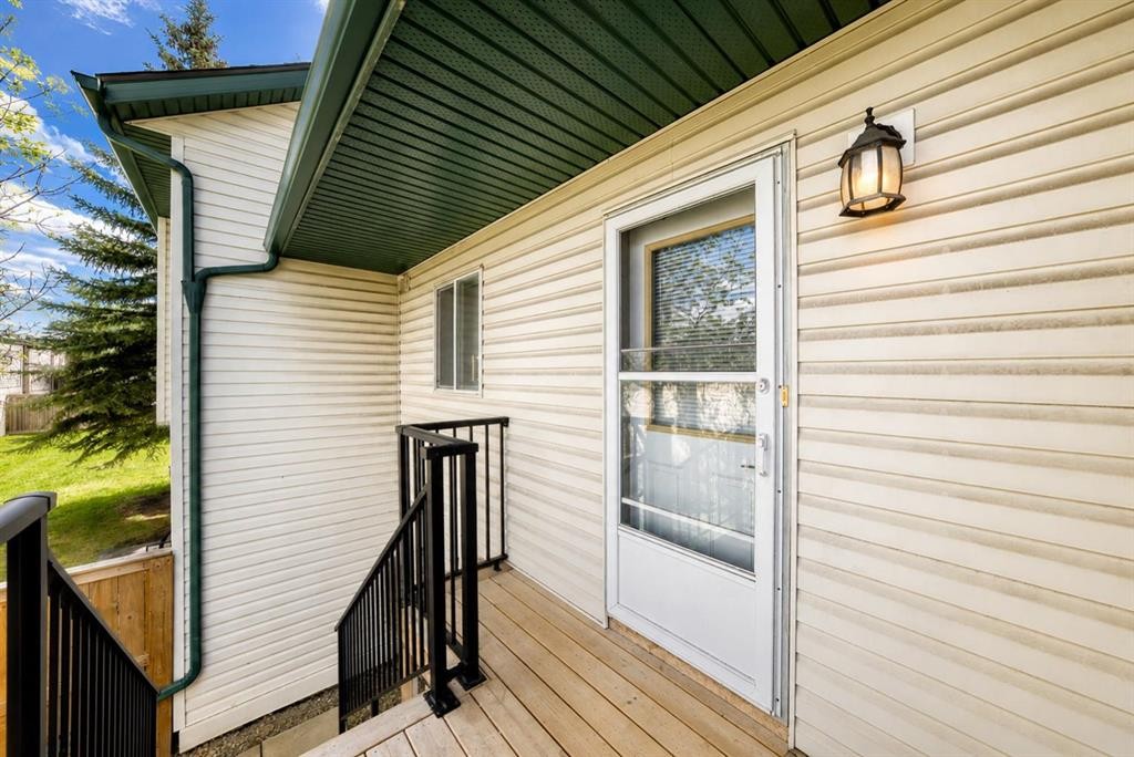 101 Hidden Valley Villas Nw, Calgary, AB - Outdoor With Deck Patio Veranda With Exterior