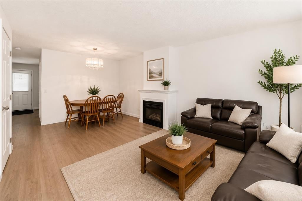 101 Hidden Valley Villas Nw, Calgary, AB - Indoor Photo Showing Living Room With Fireplace