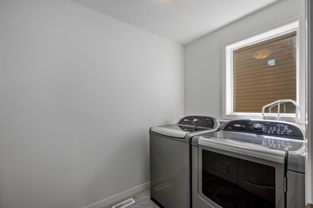 31 Chaparral Valley Way Se, Calgary, AB - Indoor Photo Showing Laundry Room
