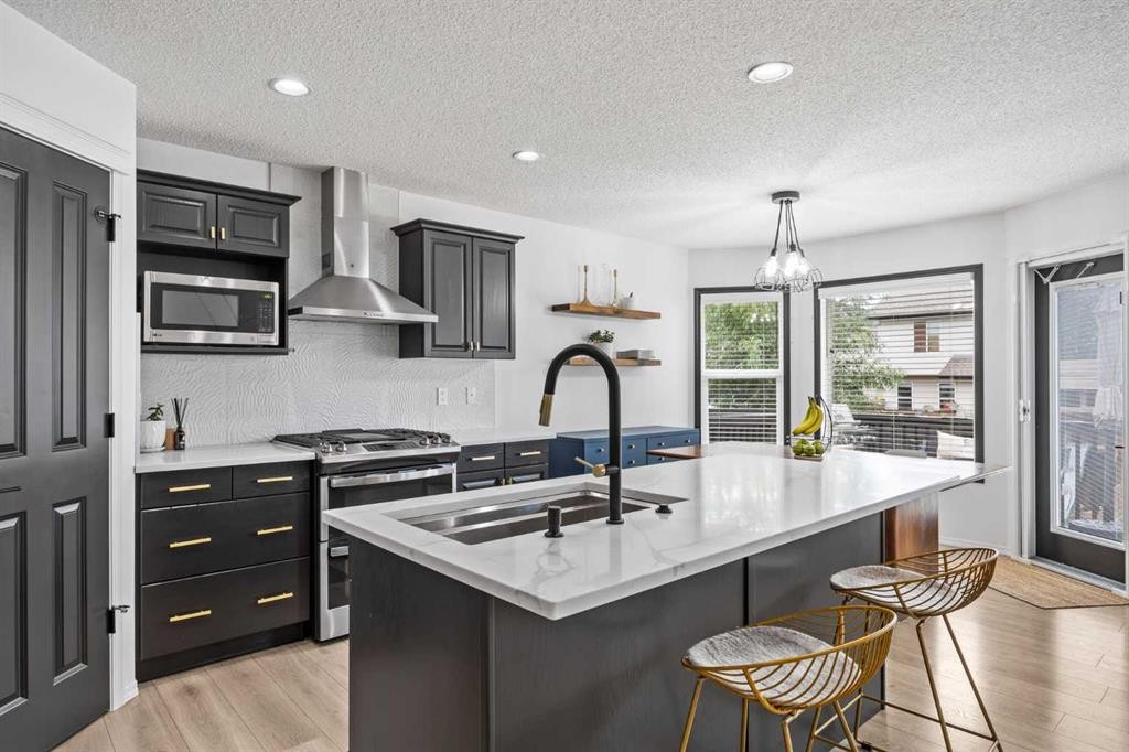 164 Silverado Range Close Sw, Calgary, AB - Indoor Photo Showing Kitchen With Double Sink With Upgraded Kitchen