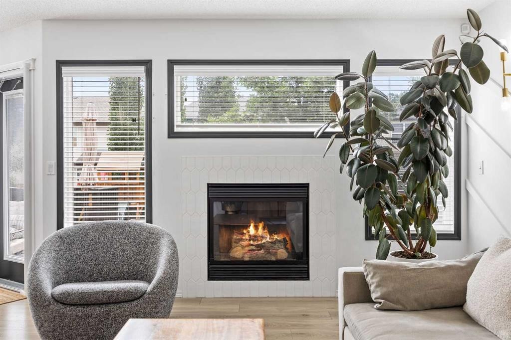 164 Silverado Range Close Sw, Calgary, AB - Indoor Photo Showing Living Room With Fireplace