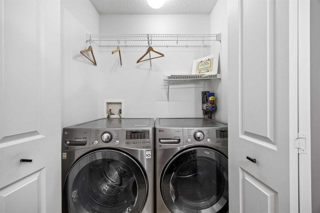 164 Silverado Range Close Sw, Calgary, AB - Indoor Photo Showing Laundry Room
