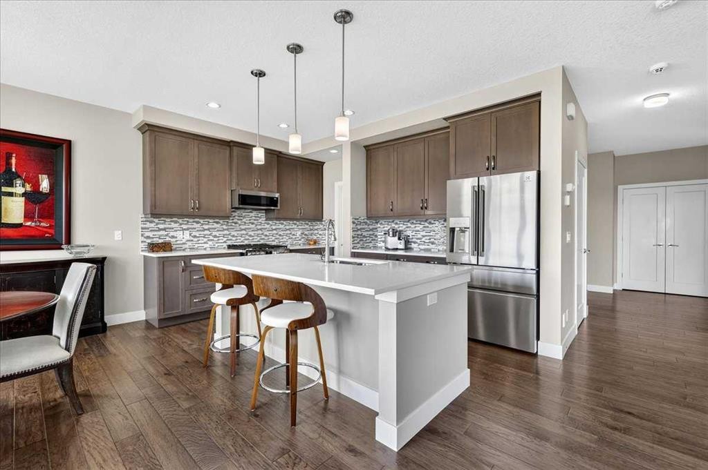 69 Cimarron Springs Circle, Okotoks, AB - Indoor Photo Showing Kitchen With Upgraded Kitchen