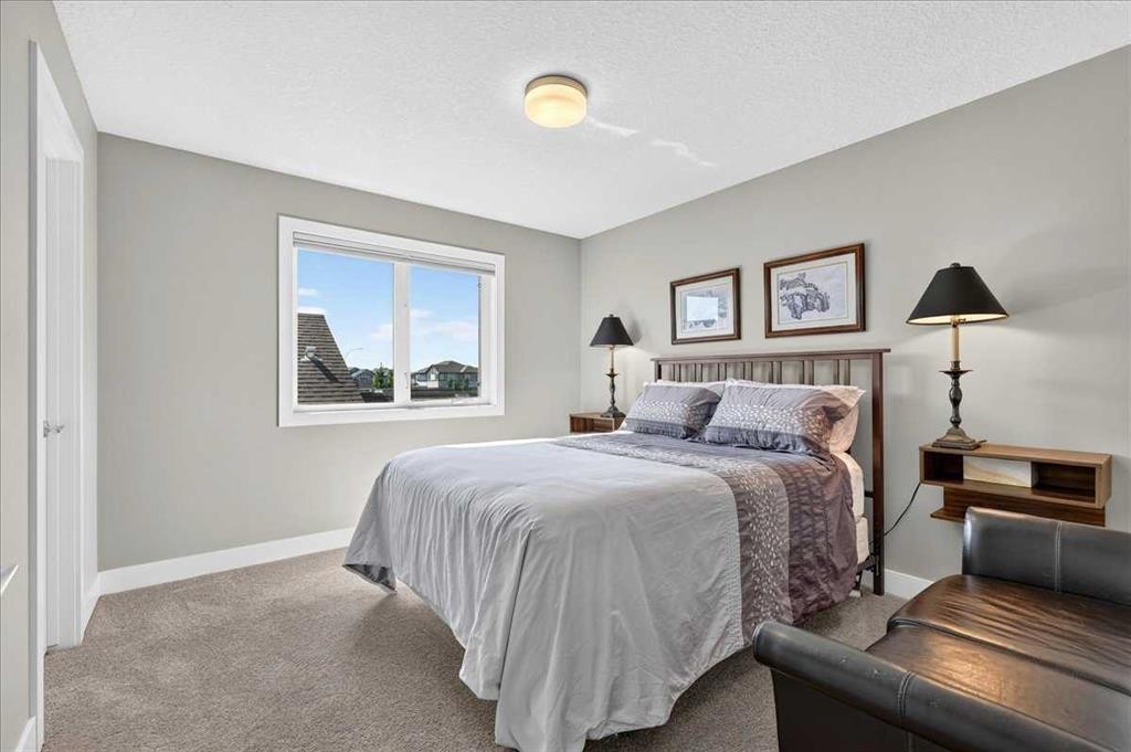 69 Cimarron Springs Circle, Okotoks, AB - Indoor Photo Showing Bedroom