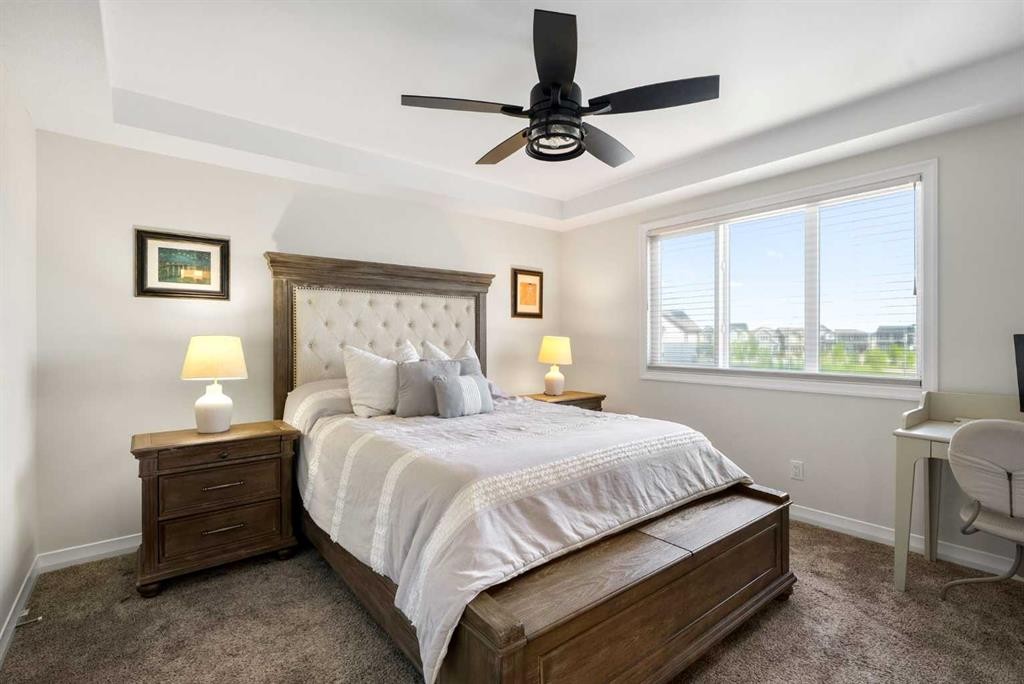 31 Magnolia Grove Se, Calgary, AB - Indoor Photo Showing Bedroom